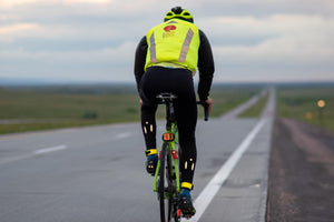 Rear view of cyclist Keith Morical riding across the U.S. as he sets a Guinness World Record for fastest time cycling though every state