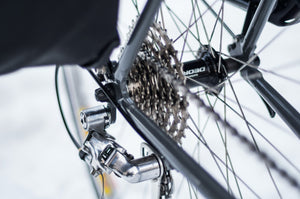 Close-up of a rear bicycle cassette and chainstay