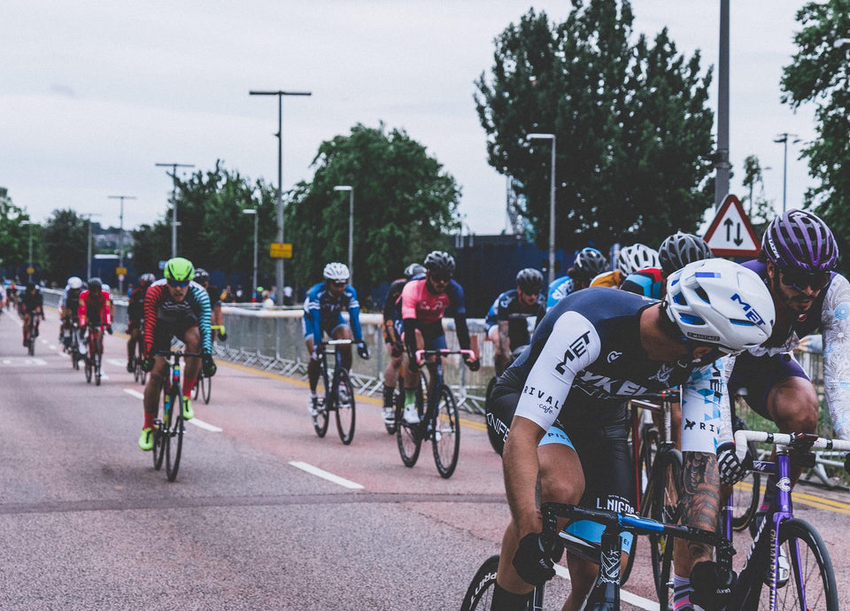 Group of cyclists riding on the road