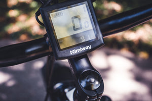 Cycling computer screen displaying speed and tripmeter
