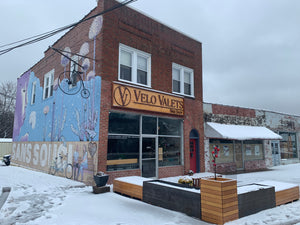 Snowy storefront of Velo Valets bike shop in Greenville, South Carolina