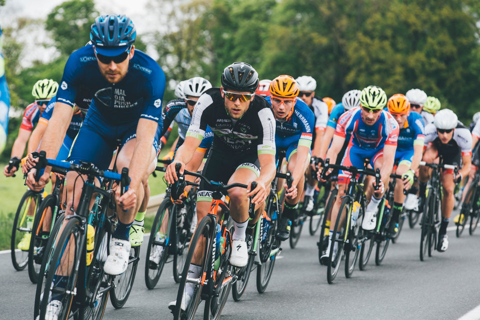 Group of cyclists riding together in a paceline
