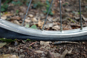 Close-up of a flat bicycle tire