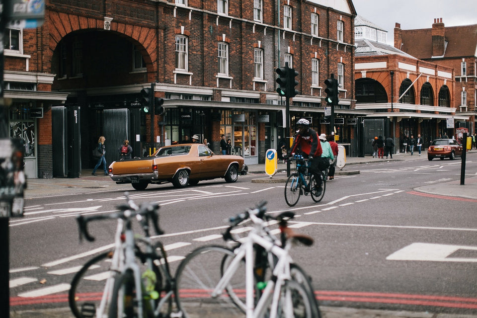 Cyclist riding through an intersection in London