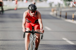 Man cycling on an empty road