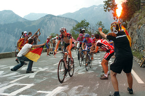 Riders finishing a mountain climb at the Tour de France