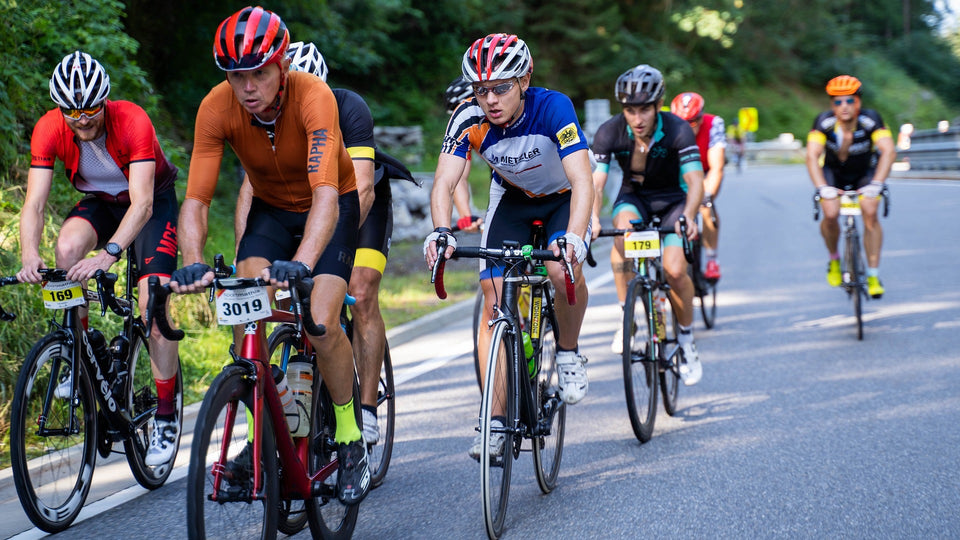 Group of road cyclists competing in a race