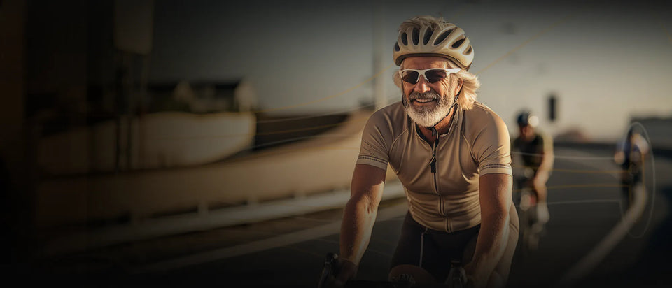 Man cycling on a road with a blurred background