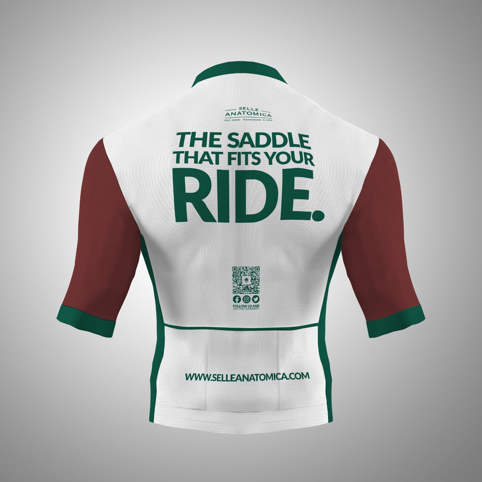 Road jersey in a mix of red, green, and white. It features Selle Anatomica branding, including large text that says 'The saddle that fits your ride.'