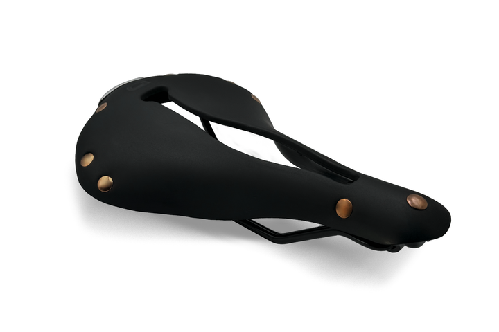Side view of the Selle Anatomica R1 black rubber bicycle saddle with copper rivets