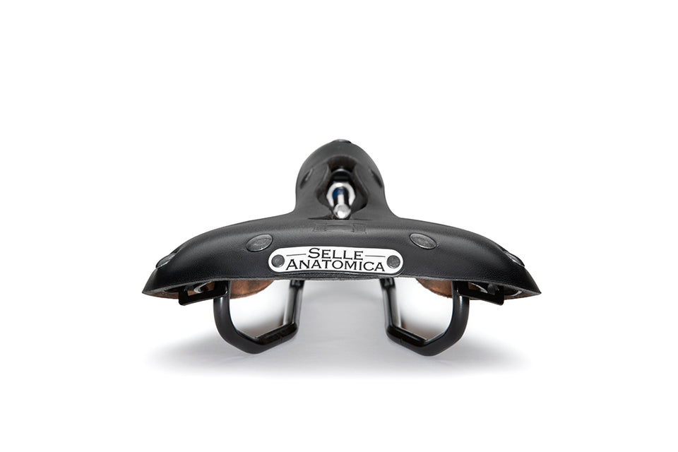 H1 black bike saddle rear with gunmetal accents, showing the Selle Anatomica nameplate and steel rails