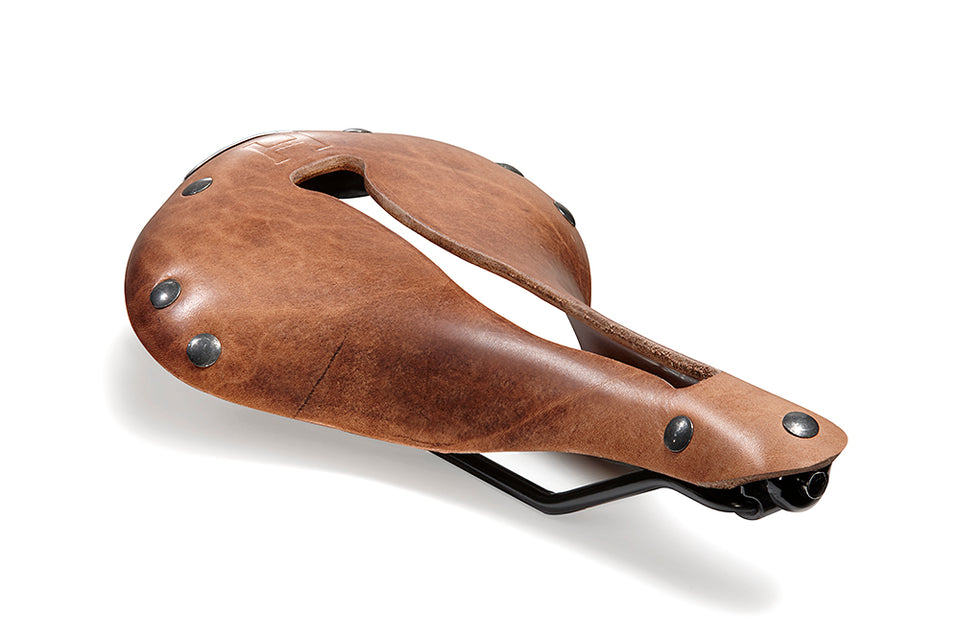 The Selle Anatomica H series H1 bicycle saddle, shown in tool leather with gunmetal rivets